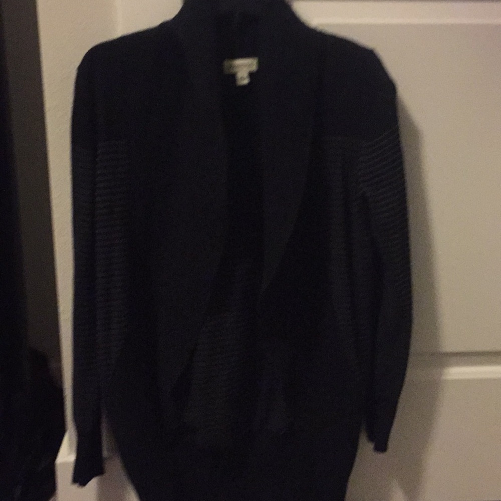 Black sweater with gray stripes.